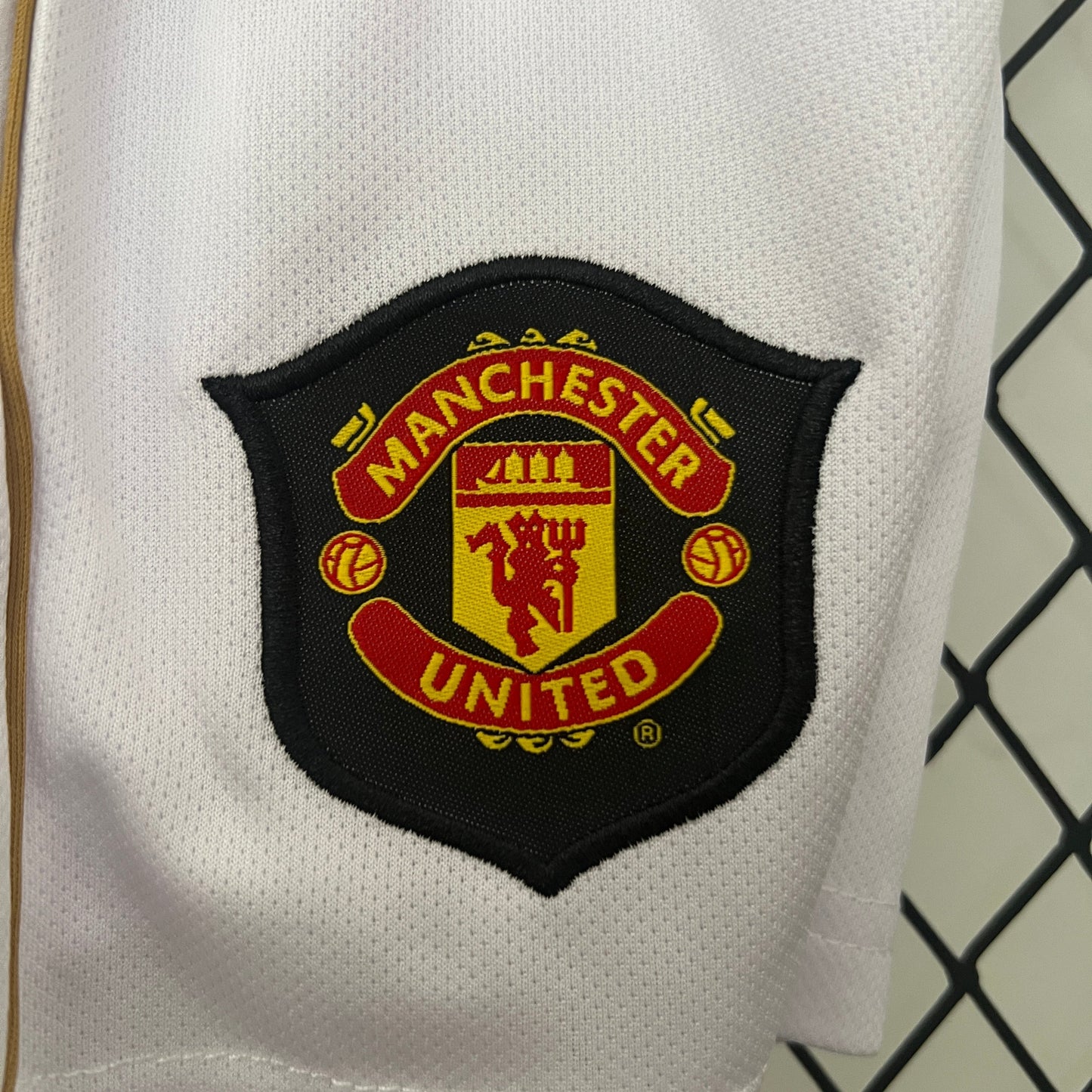 KIT INFANTIL RETRÔ MANCHESTER UNITED HOME 06/07