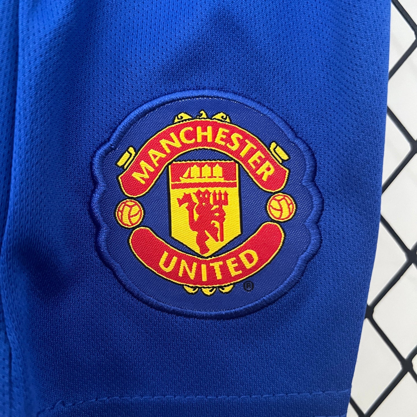 KIT INFANTIL RETRÔ MANCHESTER UNITED BLUE 08/09