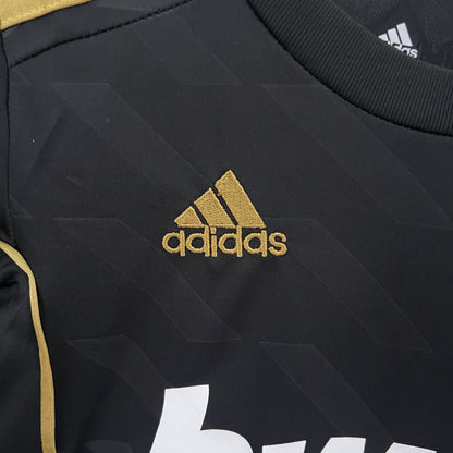 KIT INFANTIL RETRÔ REAL MADRID AWAY 11/12
